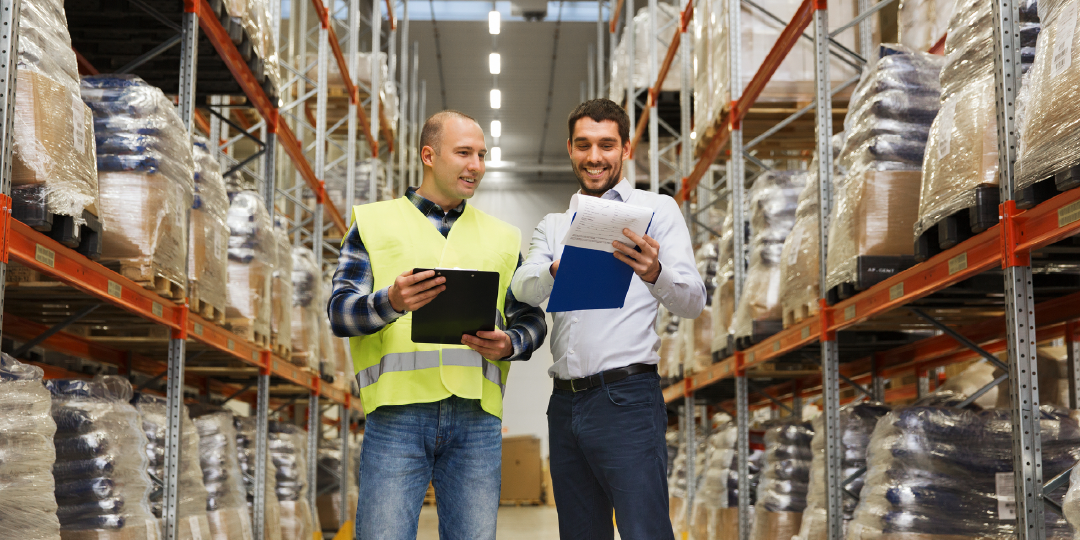 img_1080x540_two-employees-looking-at-checklist-in-warehouse